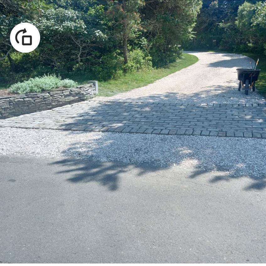 Finished cobblestone and gravel driveway