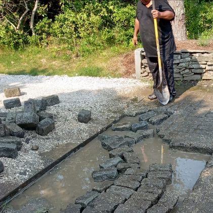 Cobblestone driveway being installed
