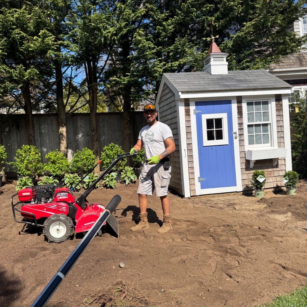Serenity Designs team installing a cottage garden