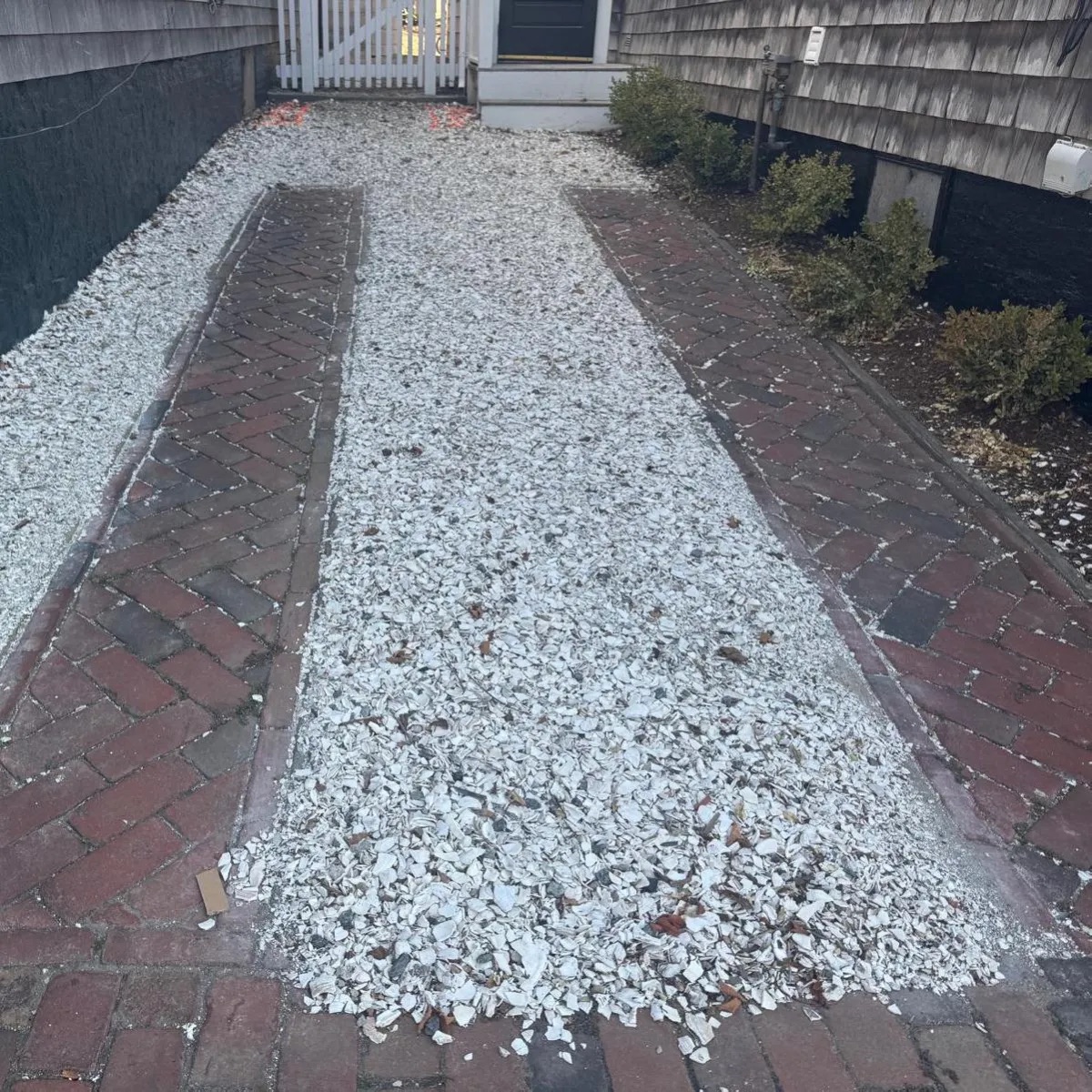 Shell driveway before brick restoration